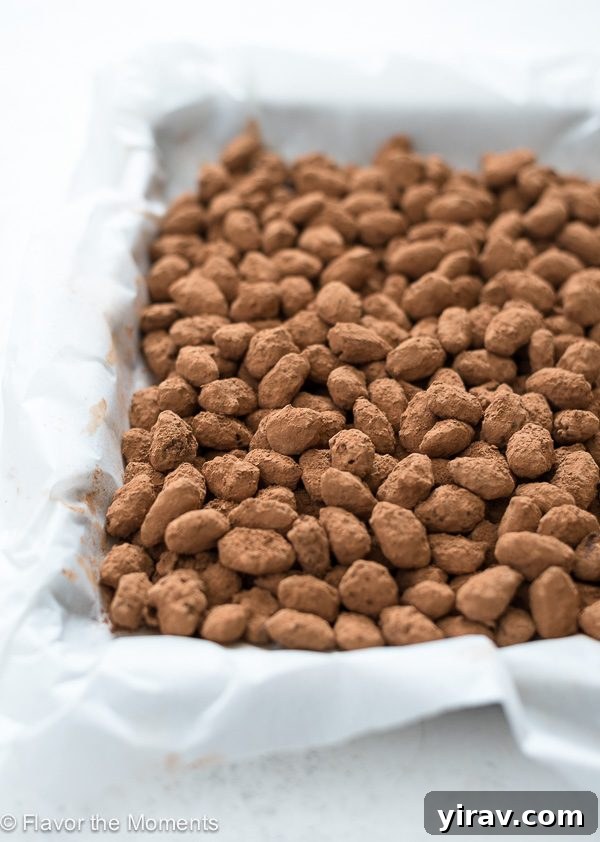 Sugar-Coated Almonds 4 Almond dragees in sheet pan lined with parchment paper