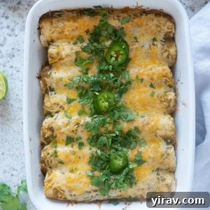 Green enchiladas in a baking dish