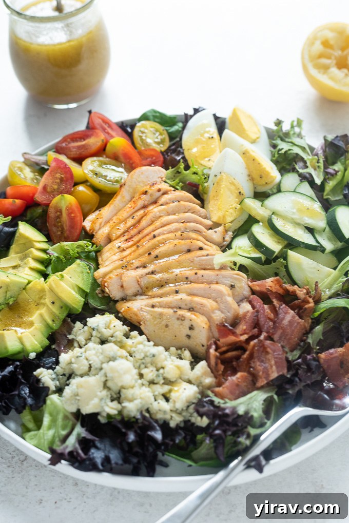 Ultimate Chicken Cobb Salad 7 Cobb salad with chicken in large white bowl