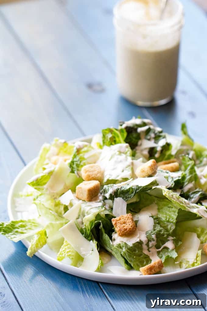 Classic Caesar salad dressing with a creamy texture, ready to elevate any salad.