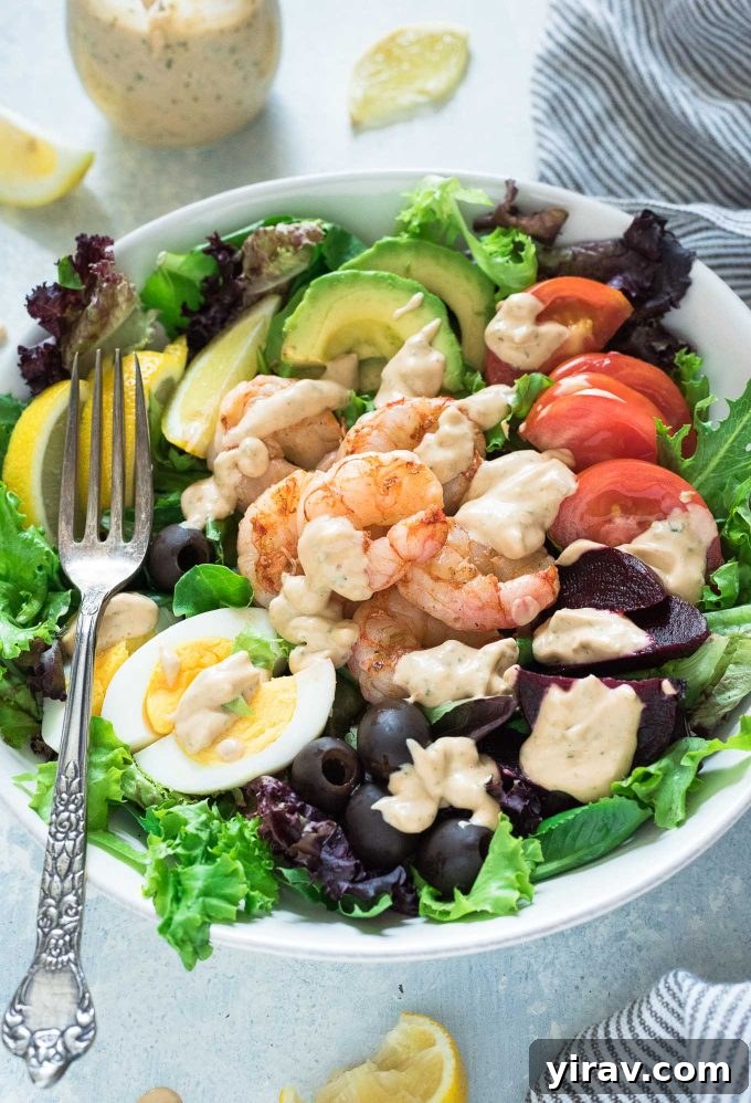 30 Refreshing Summer Salad Ideas 9 Grilled Shrimp Louie Salad generously drizzled with rich Louie dressing.