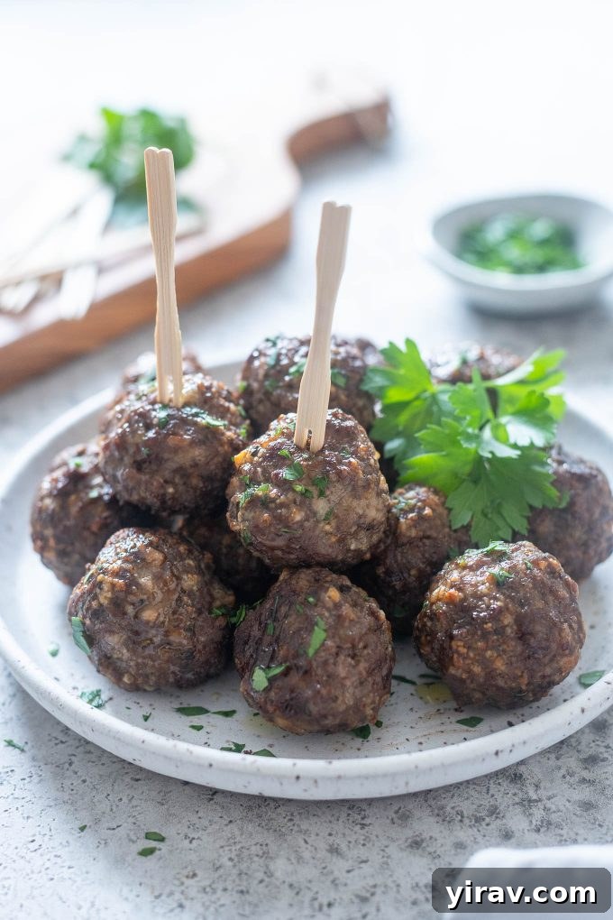 Air Fryer Magic: 15+ Effortless Meals 11 Air fryer meatballs on a plate with parsley