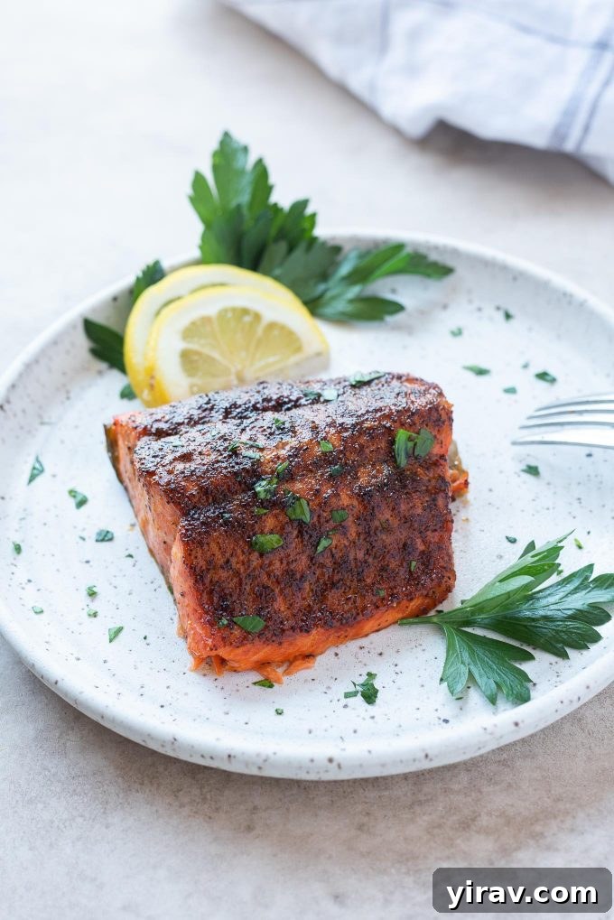Air Fryer Magic: 15+ Effortless Meals 14 Air fryer salmon on a plate with lemon and parsley