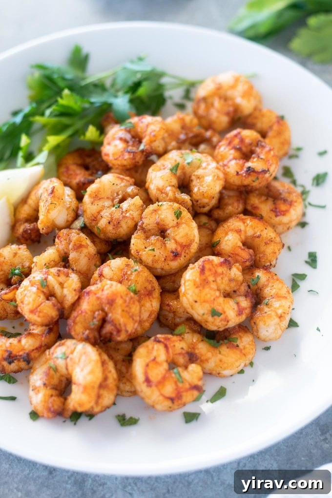 Air Fryer Magic: 15+ Effortless Meals 15 Air fryer shrimp on a platter