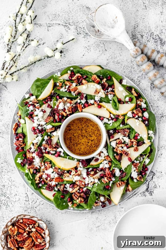 A beautifully presented Christmas Salad with Pomegranate and Pear, perfect for holiday entertaining.