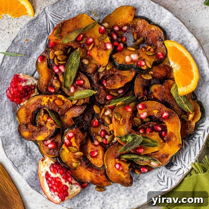 Beautifully Roasted Acorn Squash, sliced and oven-roasted in a sweet and spicy buttery sauce.