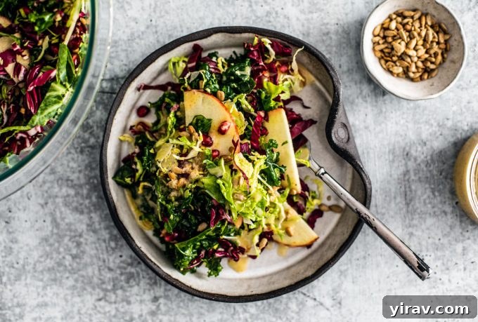A refreshing Winter Crunch Salad with Apple Cider Vinaigrette, showcasing vibrant winter produce.