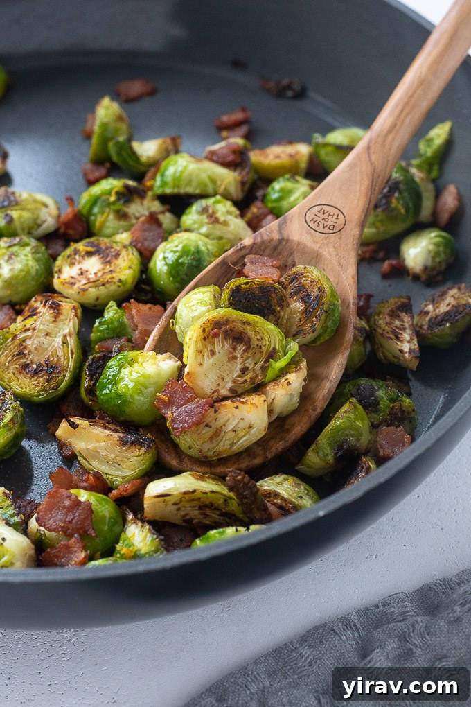 Brussels sprouts with bacon in a cooking skillet