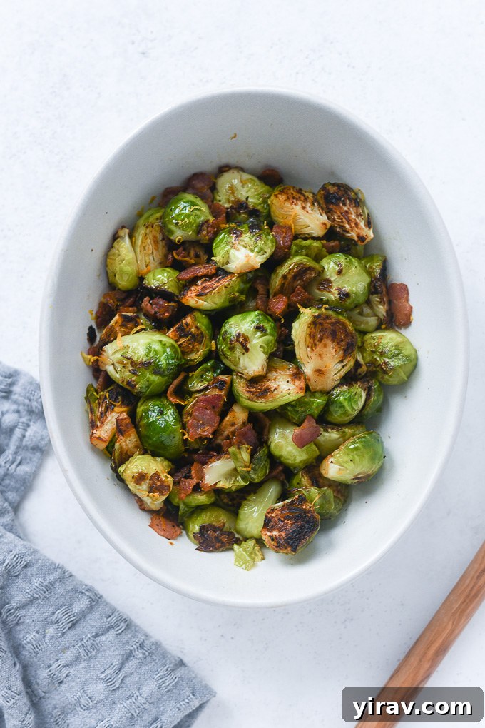 Pan fried brussels sprouts with bacon in a bowl
