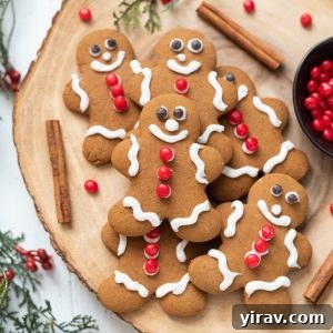 Gingerbread cookies piled on a wooden server