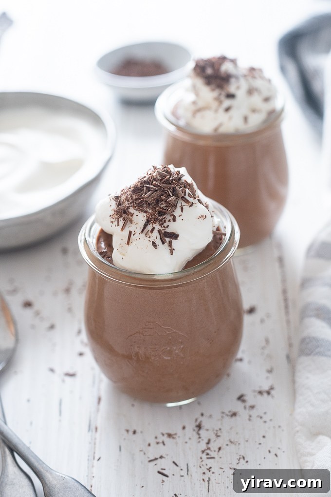 Dark chocolate mousse with whipped cream and shaved chocolate