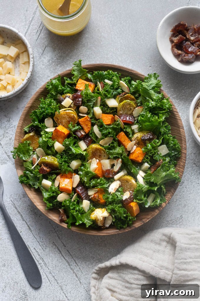 Winter roasted vegetable kale salad in a serving bowl.