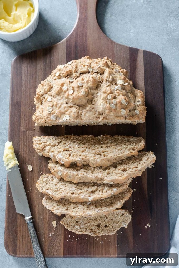 Irish brown bread sliced on a cutting board, showcasing its hearty texture