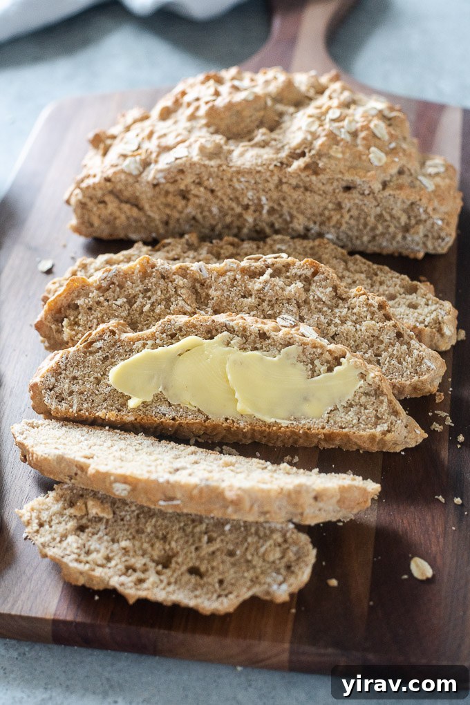 Sliced Irish brown soda bread with butter, ready to be enjoyed