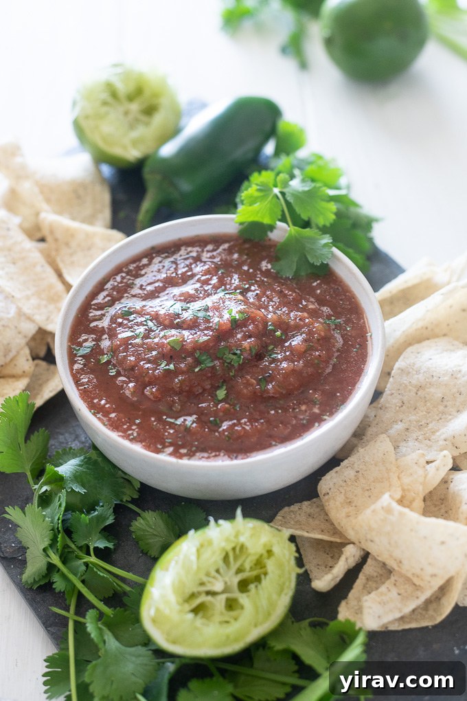 Restaurant salsa in a bowl with chopped cilantro on top