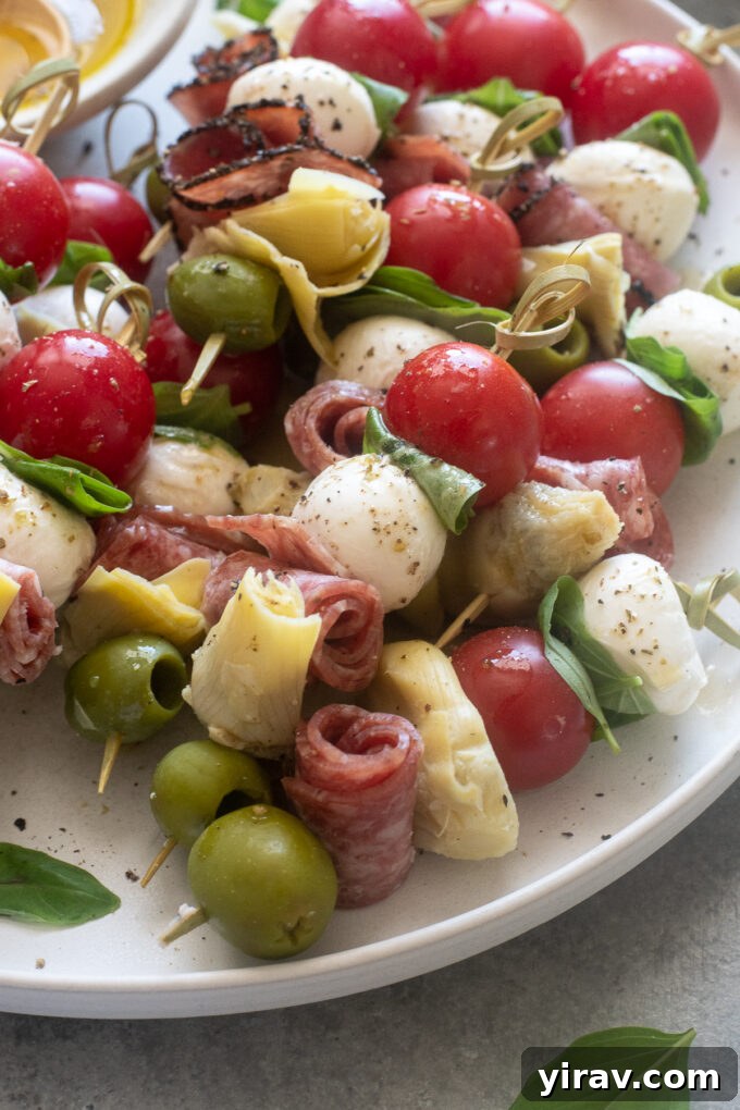 Antipasto Bites 7 Mini Antipasto Skewers on a platter.
