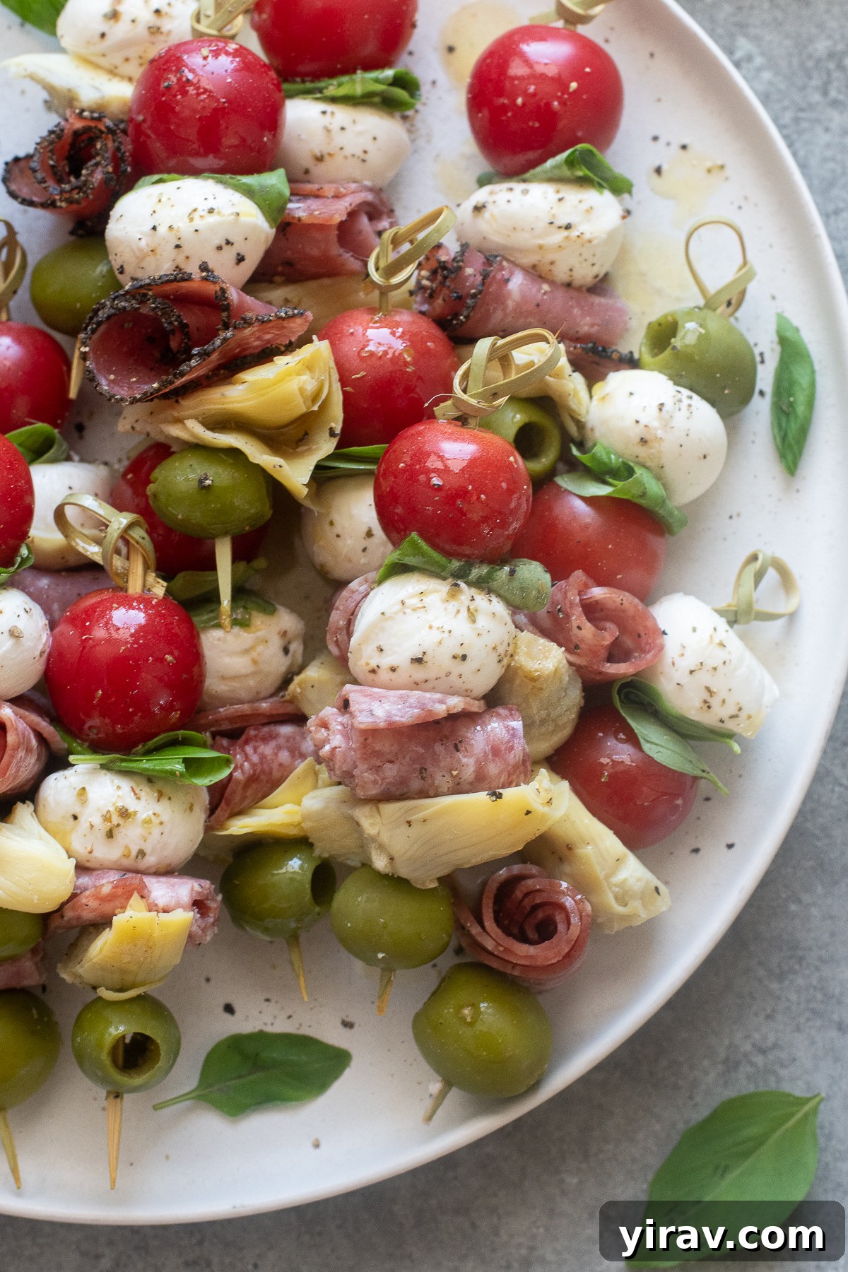 Antipasto Bites 8 Antipasto skewers on a platter.