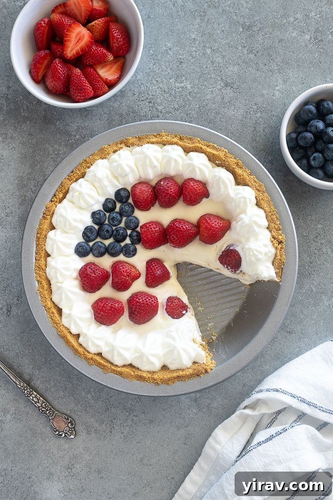 Easy no bake cheesecake with a slice cut out, ready to serve