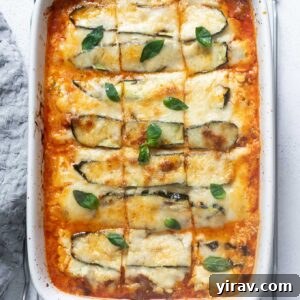 Zucchini lasagna in a baking dish cut into squares