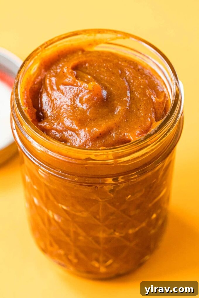 Homemade Pumpkin Butter in a jar, ready to spread