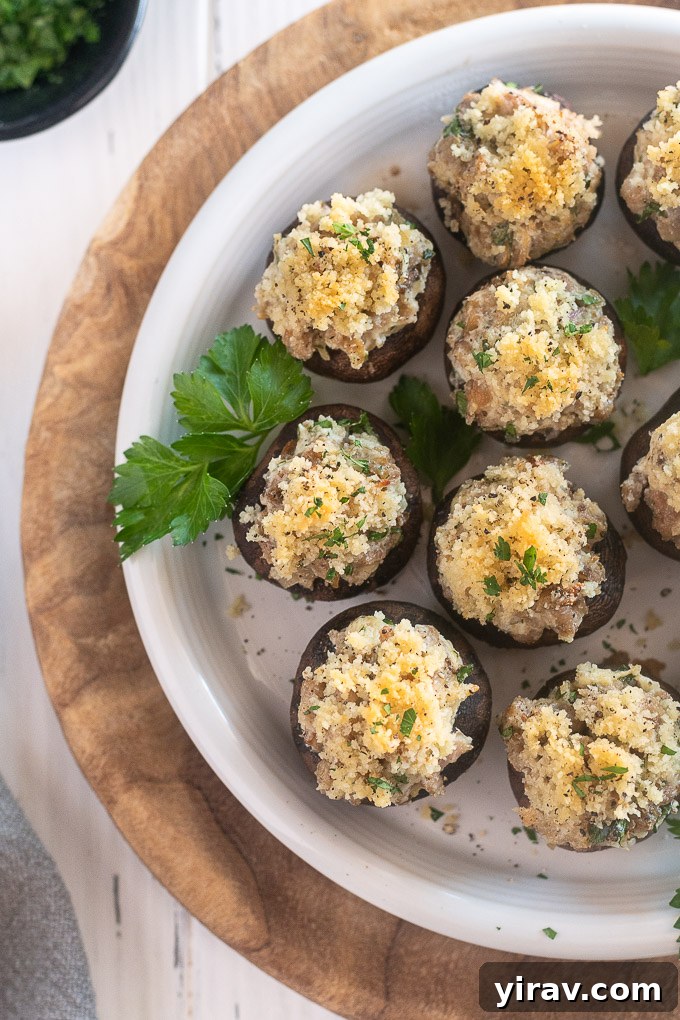 Italian Sausage Stuffed Mushrooms on a serving plate