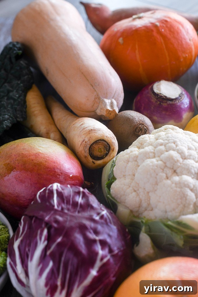 Winter produce including parsnips, butternut squash, and mango