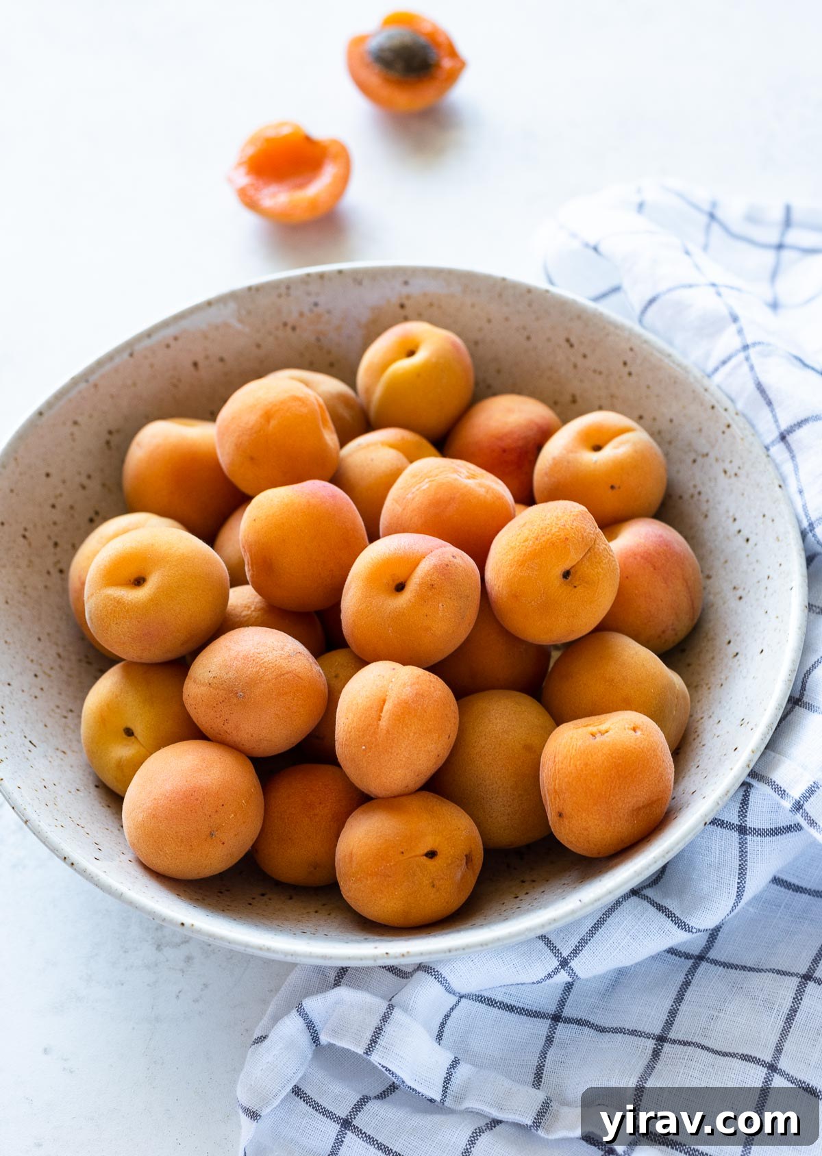 Handcrafted Golden Apricot Jam 3 A bowl filled with fresh, ripe apricots, highlighting their beautiful color and readiness for jam making.