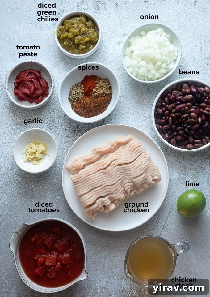 Ground chicken chili recipe ingredients laid out on a table.