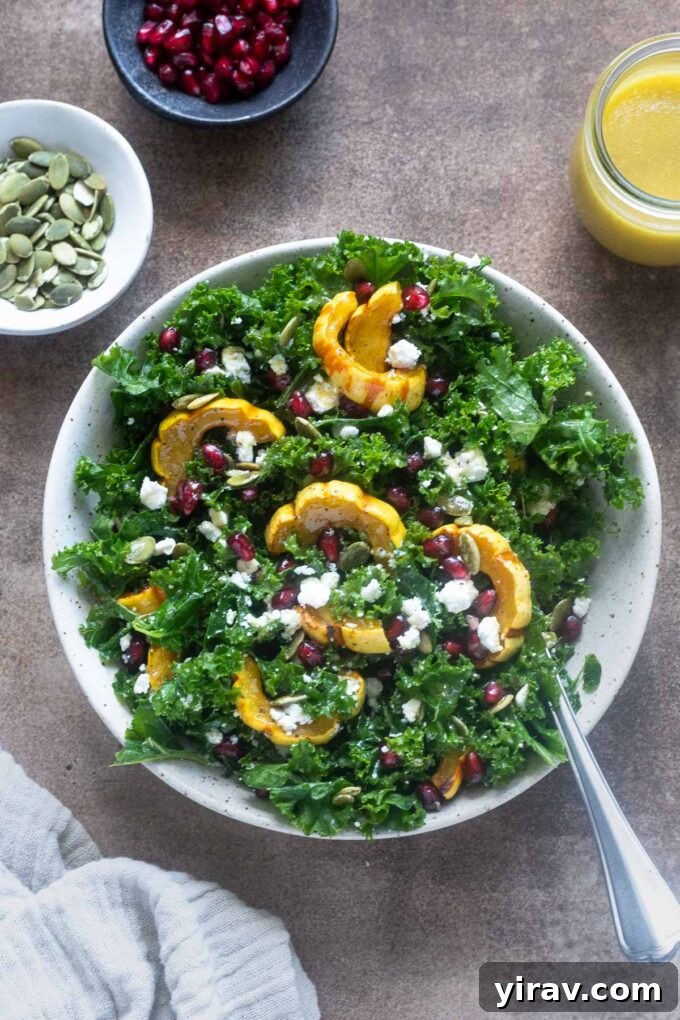Roasted Delicata Squash Salad elegantly tossed in a serving bowl, ready to be enjoyed.