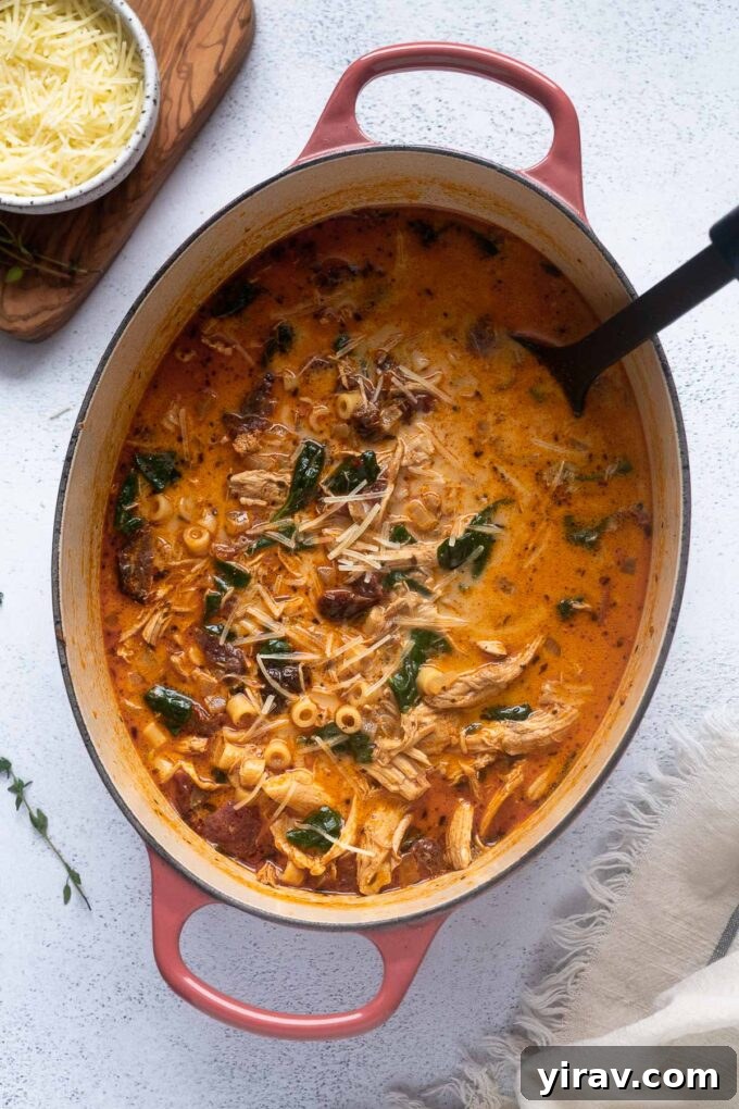 Cupid's Comfort Chicken Soup 3 Marry me chicken soup simmering in a large Dutch oven.