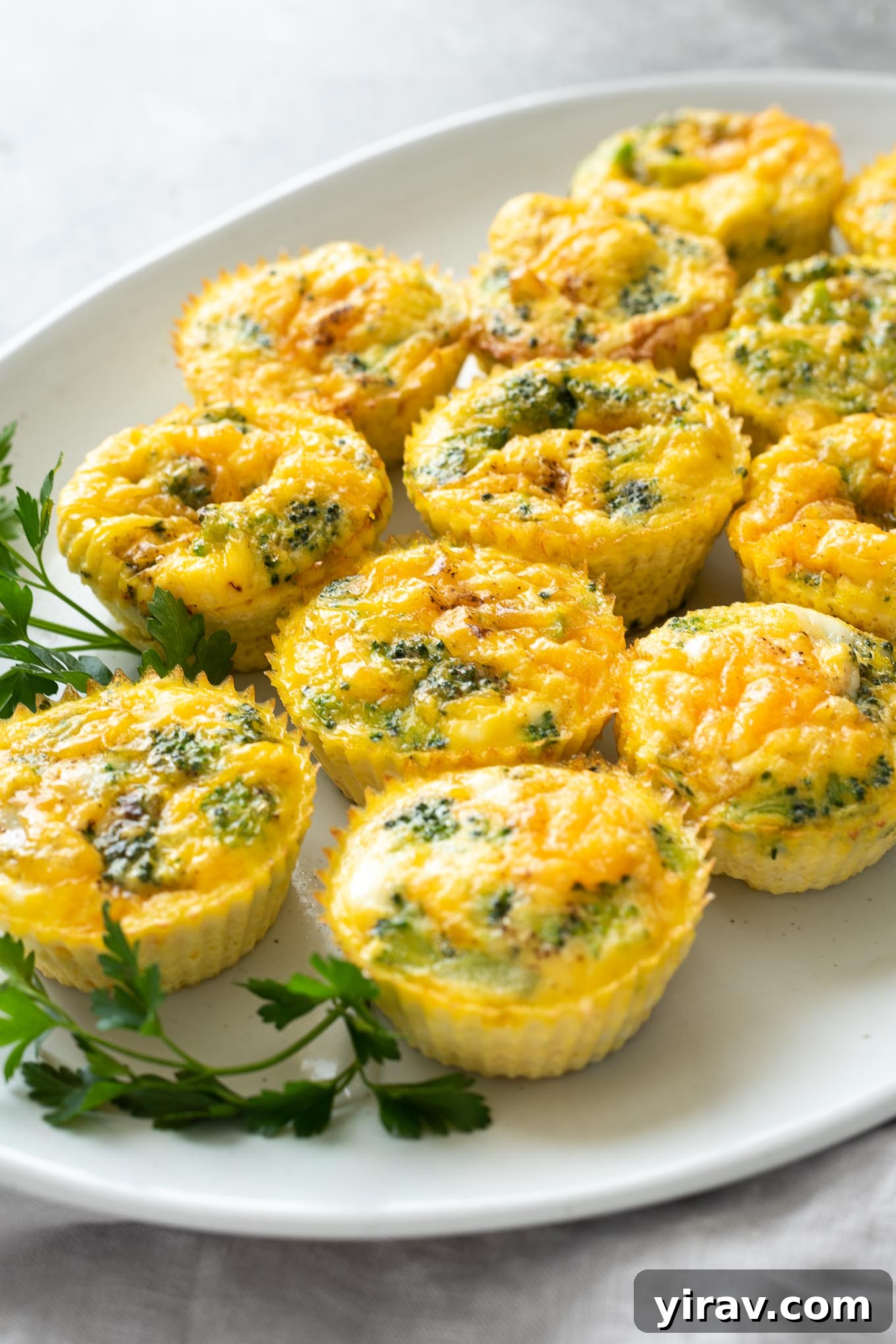 Mini crustless broccoli quiche on a serving platter