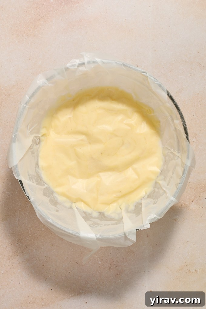 Creme patissiere with buttered parchment over top.