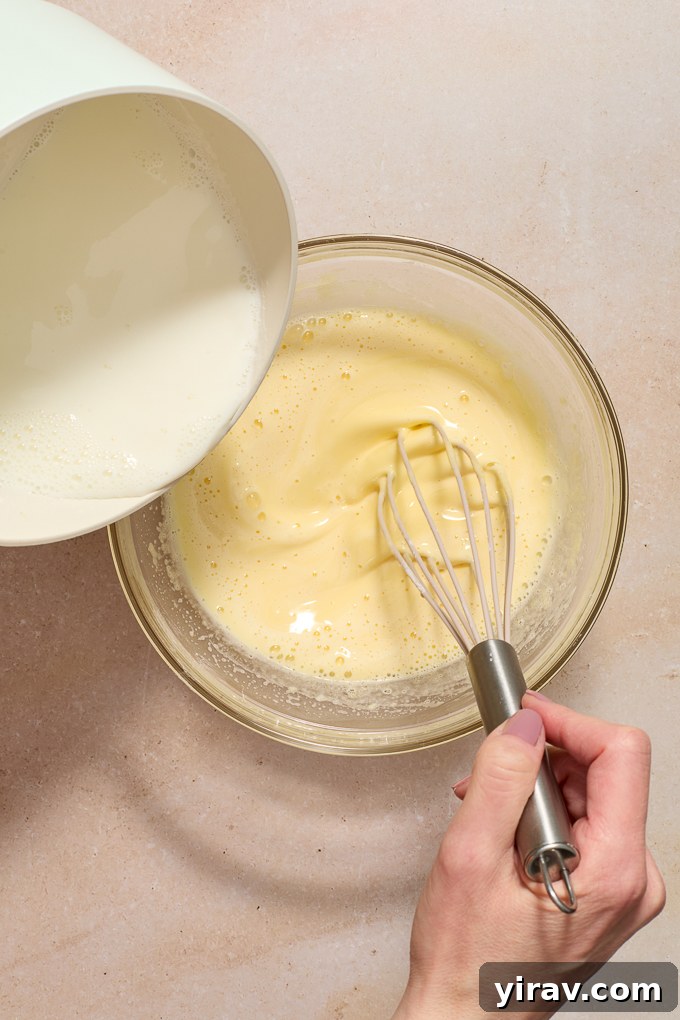 Milk whisked into pastry cream to temper eggs.