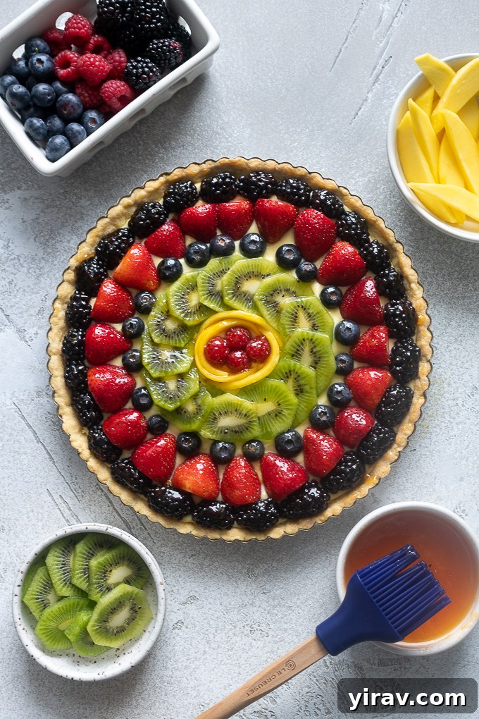 A glossy fruit tart, freshly glazed with apricot jelly for a brilliant shine