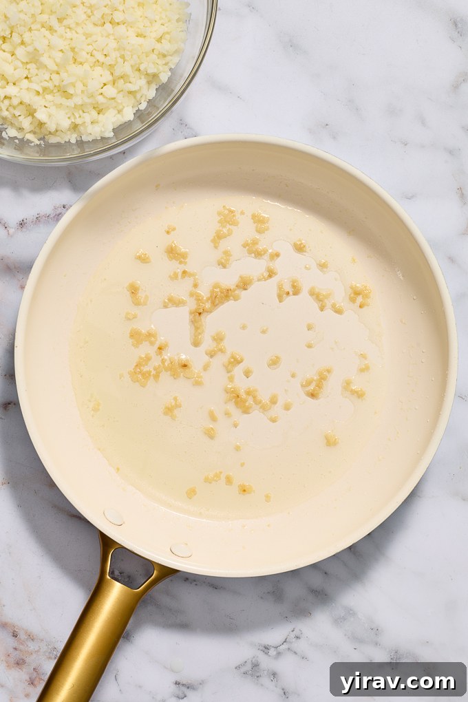 Cooked garlic in skillet.