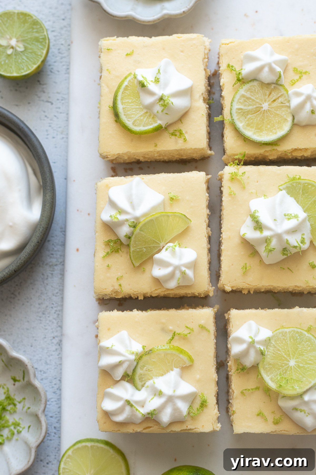 Delicious Key Lime Cheesecake Bars, neatly cut into squares and ready to be enjoyed.