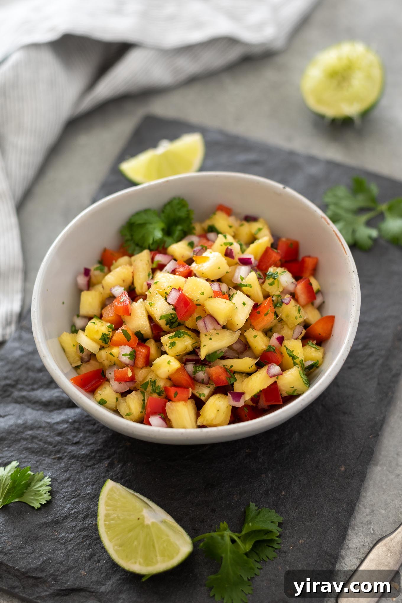 Fresh Pineapple Salsa served in a white bowl, showcasing its vibrant colors and inviting texture.