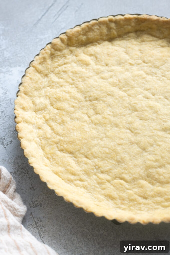 Buttery Sweet Tart Dough 12 A baked Pâte Sucrée tart crust, golden and ready for filling.