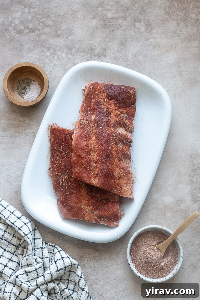 Baby back ribs seasoned with bbq rub.