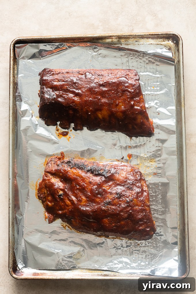 Caramelized barbecue baby back ribs after broiling.