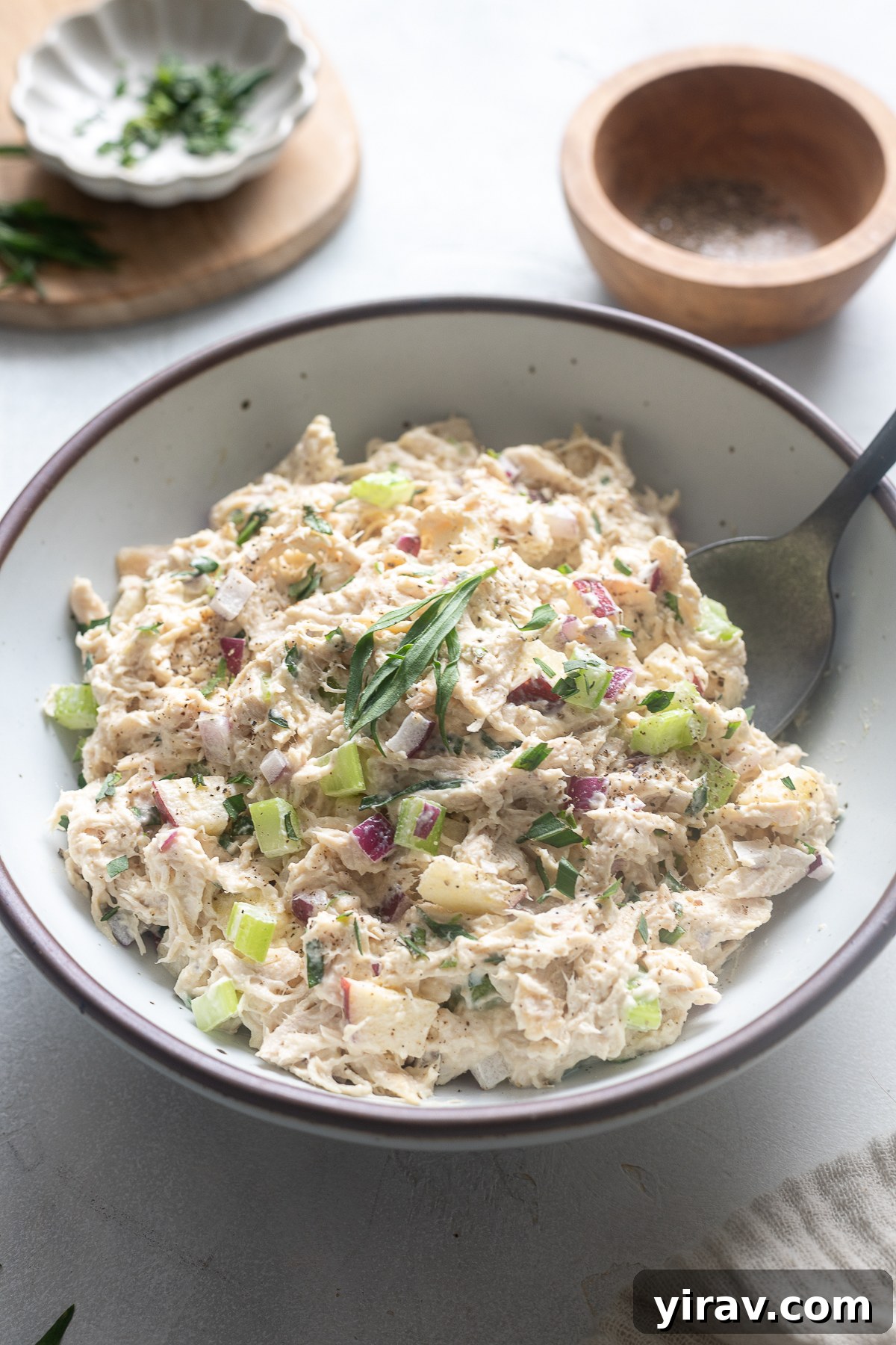 Chicken salad with tarragon in a serving bowl.