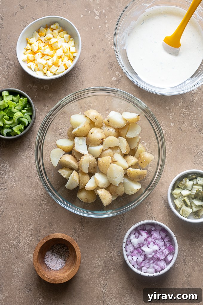 Prepped ingredients for potato salad with eggs and dill.