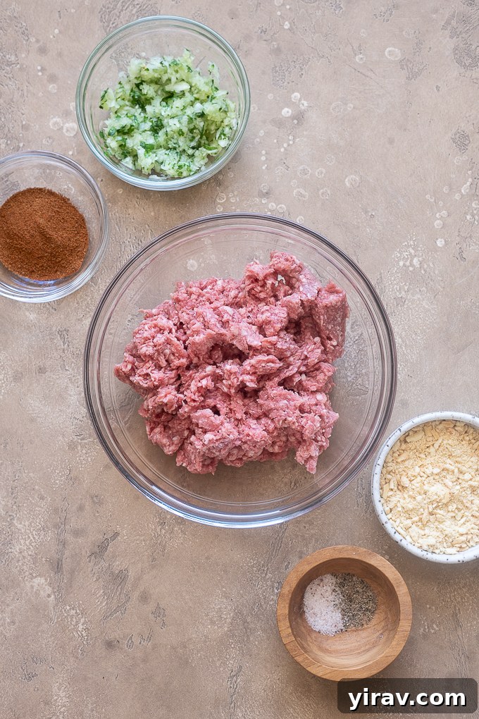 Ground lamb in a large bowl, ready for the kofta mixture.