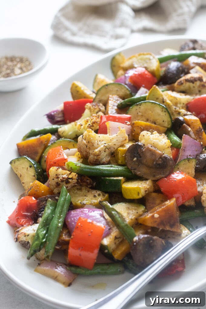 A colorful platter of perfectly roasted vegetables made in an air fryer.