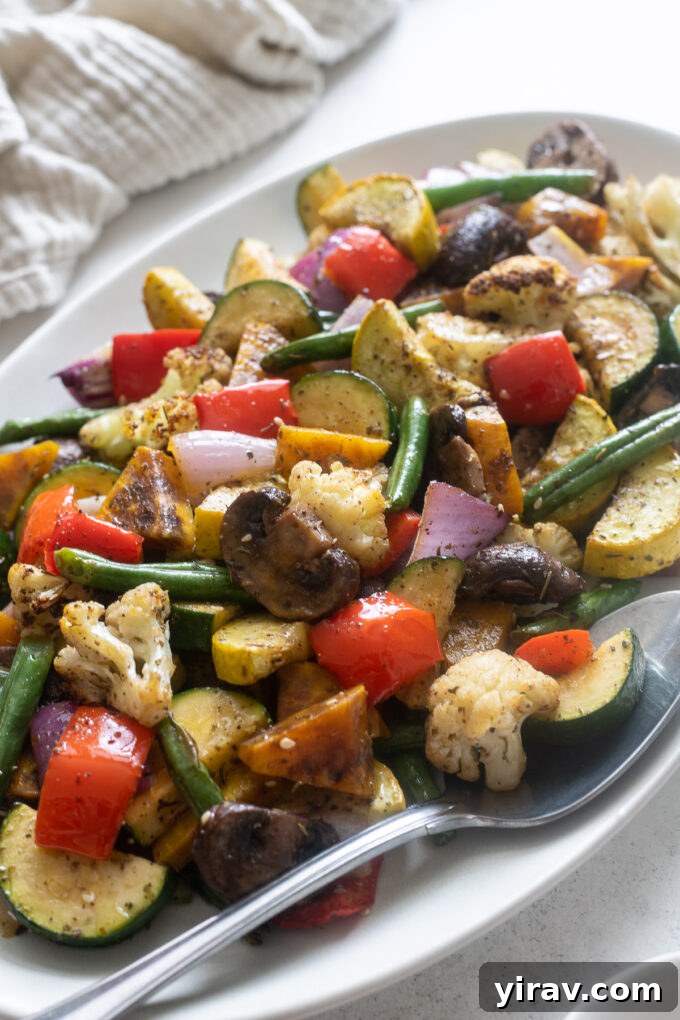 A vibrant platter of air fryer roasted vegetables seasoned with za'atar spice.