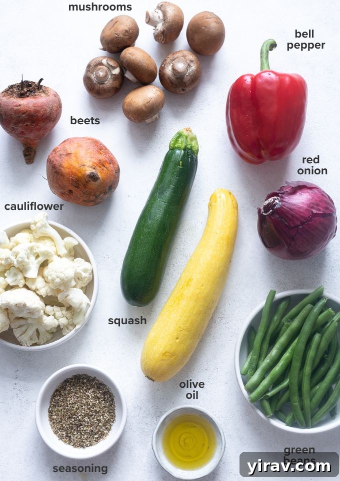 Various fresh vegetables laid out for an air fryer roasted vegetable recipe.