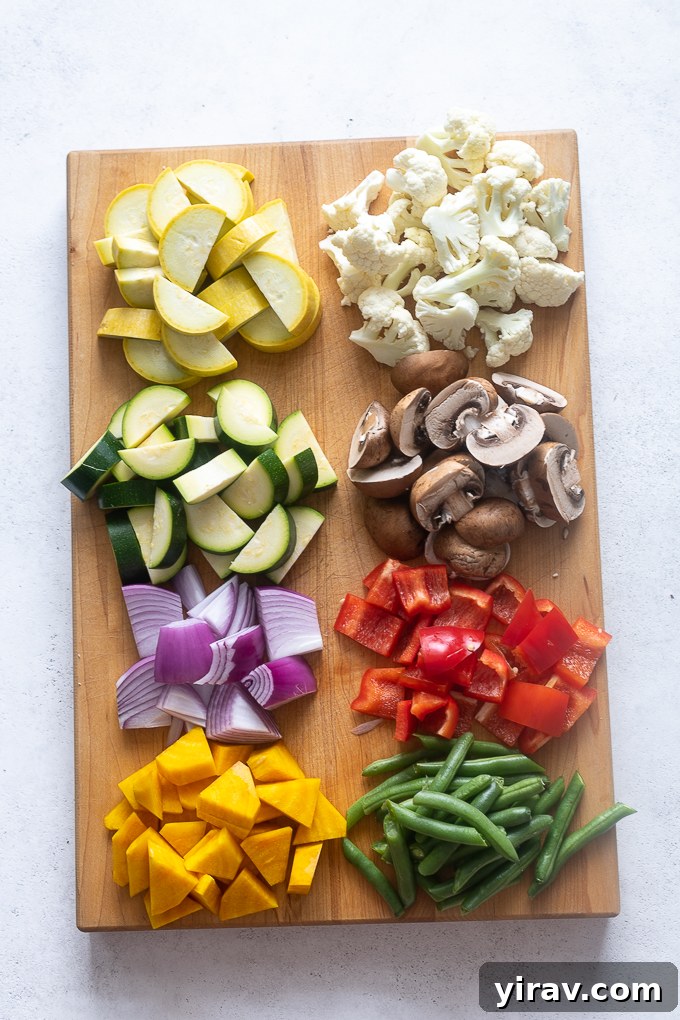 Various raw vegetables cut into uniform pieces for air frying.