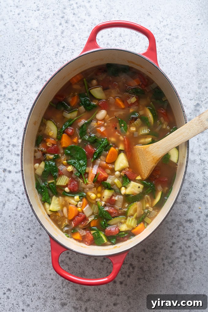 Soupe au pistou simmering in a Dutch oven.