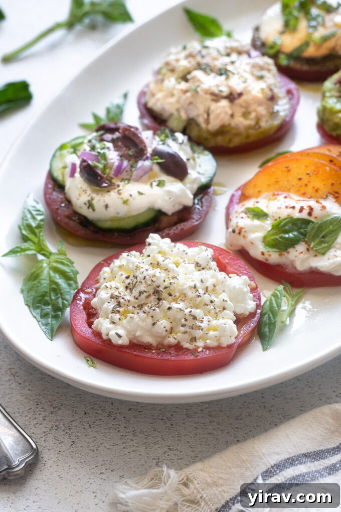 A fully assembled Heirloom Tomato Flight presented on a platter with all six different toppings visible.