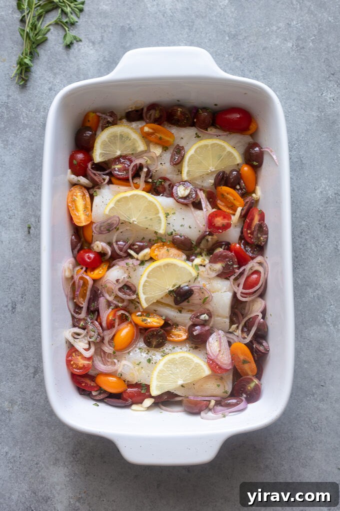 Pour cherry tomato mixture over cod filets in baking dish.